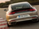 Produkte Produkt-Fakten Panamera Panamera Turbo S E-Hybrid Exterieur braun hinten fahrend Panamera (G2) TitelPanamera Turbo S E-Hybrid (US-Version)